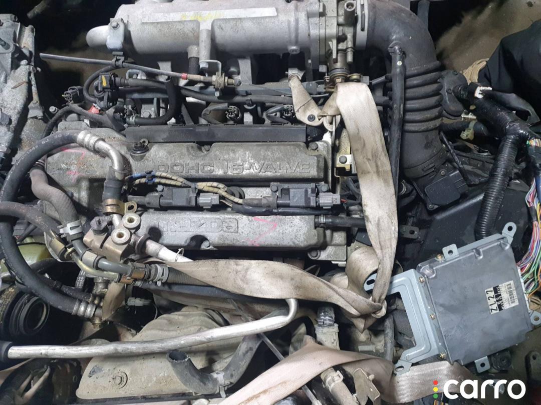 Двигатель Mazda Familia BJ 2002г. - фото №1