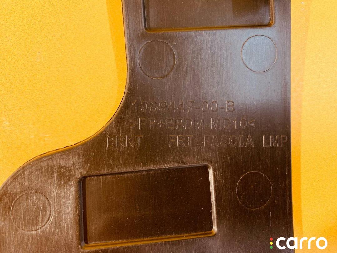 1089447-00-B кронштейн (крепление) левый Tesla Model 3 1 поколение 2020г. - фото №3