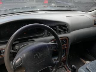 Kia Clarus 1 поколение [рестайлинг] 2000г. 2.0 л., FE (16V), бензин, МКПП - фото №1