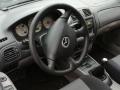 Mazda 323 6 поколение [рестайлинг] 2002г. 2.0 л., RF, дизель, МКПП - фото №2