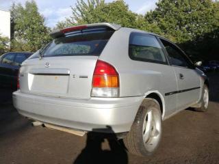 Mazda 323 6 поколение 1998г. 1.3 л., B3, бензин, МКПП - фото №2