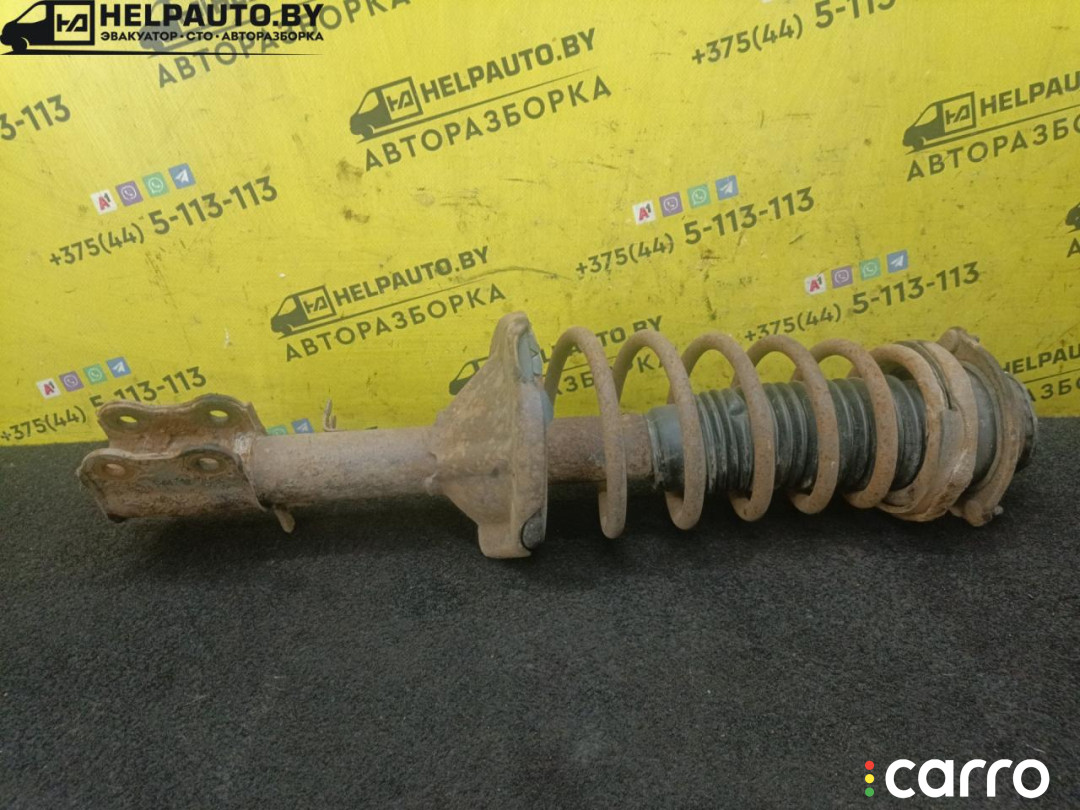 стойка амортизатора задняя левая Kia Shuma 1 поколение 1999г. - фото №1