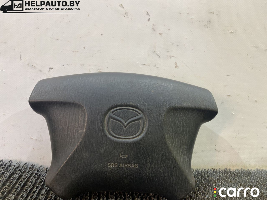 подушка безопасности водителя Mazda 626 5 поколение 1999г. - фото №1