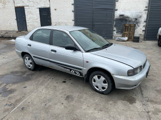Suzuki Baleno 1 поколение 1998г. 1.3 л., G13BB - фото №2