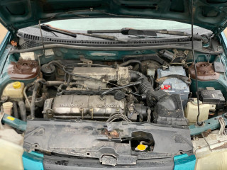 Mazda 323 5 поколение 1998г. 1.4 л. - фото №1
